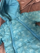 Kombinezon turkusowy 74