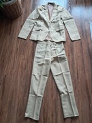 Nowy chłopięcy garnitur w kolorze szampana chyba na wzrost około 150 cm 