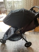 Spacerówka baby joger plus fotelik axkid tyłem
