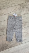 Sinsay spodnie w dinozaury joggersy jeans 74cm