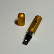 Pojemnik na perfumy atomizer rozpylacz samolot auto transport ZŁOTY