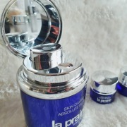 La Prairie- puste słoiki po kremach