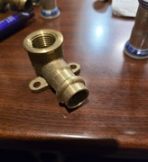 kolanko mosiezne z uchwytem 15 1/2