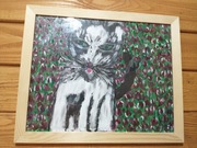 Obraz malowany własnoręcznie na płótnie akrylem.Kotek w tulipanach.