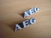 AEG - logo / emblemat [cena za komplet - 2 szt]