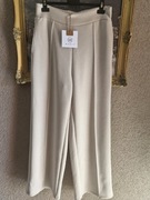 Spodnie damskie szerokie typ masełko z lampasami Mooij