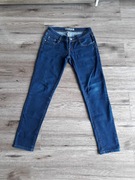 Damskie spodnie jeansowe z niskim stanem biodrówki rozmiar S 36 ciemne 