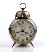 stary budzik Junghans z reklamą 1910