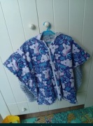 Ponczo samochodowe do fotelika 70*55cm