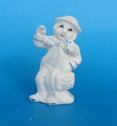 figurka porcelanowa - kobieta z torebką