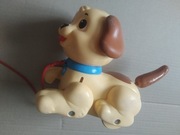 Zabawki fisher price słonik piesek, bączek nakręcany, wszystkie razem.