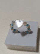 Pierścionek nowy, regulowany,serce- masa perłowa 8x8 mm.