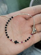 Bransoletka różaniec krzyżyk rubin noc Kairu hematyt regulacja przedłużka 