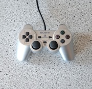 Oryginalny pad SONY Dualshock 2, PS2, SCPH-10010 A, sprawny, srebrny