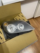 Lampy przednie opel astra h 