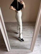 Jeansy Never Denim z wysokim stanem proste