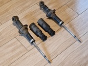 Tylne amortyzatory Mitsubishi Lancer (4162A036) z osłonami/odbojami