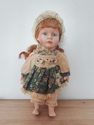 Lalka porcelanowa wys 29,5 Dziewczynka z opaską