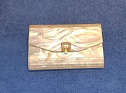 Torebka plastikowa o wyglądzie masy perłowej. Dość stara, z wadami.