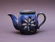 ceramiczny podgrzewacz w kształcie czajnika