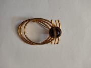 Broszka vintage metaloplastyka oczko!