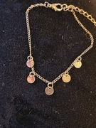 Delikatna bransoletka  damska - łańcuszek z okrągłymi blaszkami.