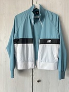 Niebieska krótka kurtka damska New Balance WJ01504WAX