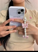 Oryginalny projekt Różowy Perła Motyl Kokarda Telefon Wisiorek 