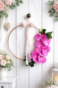 Elegancki wianek ścienny ze storczykami