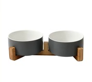 Ceramiczna podwójna miska na drewnianym stojaku