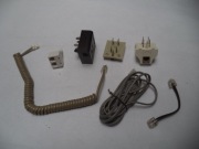 Zestaw wtyczek i kabli telefonicznych analogowych