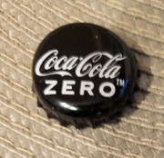 Kapsel Coca Cola butelkowane