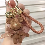 Brelok miś z dzwoneczkiem z chwostem do torebki plecaka kluczy z kokardą