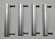 Cztery uchwyty do mebli kuchennych z PRL - u