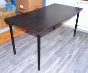 Ikea stół - blat Linnmon ciemnobrązowy, nogi Adils czarne. 140 cm.