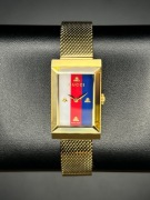 złoty zegarek Gucci G-Frame 