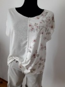 Kremowa/ mleczna koszulka z motywem roślinnym