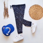 Spodnie dresowe 110 granatowe w dinozaury gwiazdki wygodne elastyczne baweł