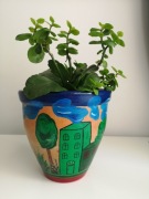 Ręcznie malowana doniczka z terakoty 