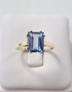 Złoty pierścionek z topazem 