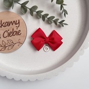 Czerwona kokardka z białym sercem