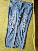 Spodnie damskie jeansy z rozdarciami plus size 50