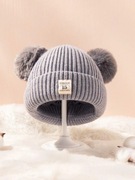 Czapka z pomponami :D 