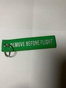 Haft "remove before flight" w kolorze zielonym
