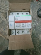 Wyłącznik główny marki Schneider oraz 3  zabezpieczenia RCBO