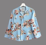 Damska bluzka wzorzysta błękitna z długim rękawem uniwersalna