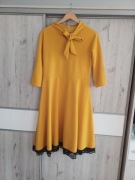 Elegancka musztardowa sukienka z wiązaniem i koronką rozmiar L/Xl|