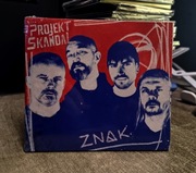 Projekt Skandal - Znak CD