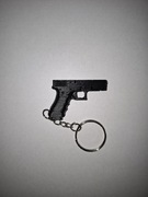 breloczek w kształcie pistoletu 