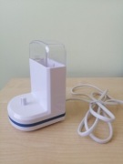 Ładowarka do szczoteczki elektrycznej firmy Nevadent